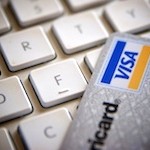 credit card on computer keyboard