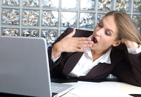 Woman_tired_yawning_laptop lack of sleep